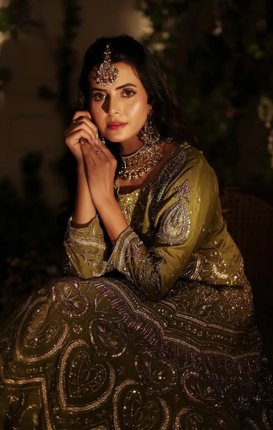 Olive-green bridal lehenga zebaish with antique gold ahsan tariq embroidery and sequin detailing